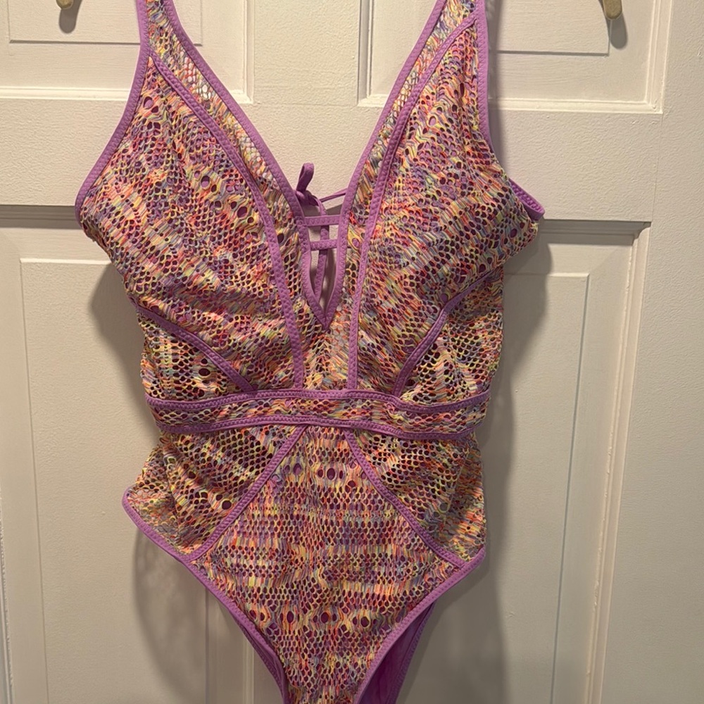 BECCA Multicolor Crochet One Piece Swimsuit no tags but never worn.